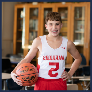 A middle school boys basketball player at Dayspring Christian Academy